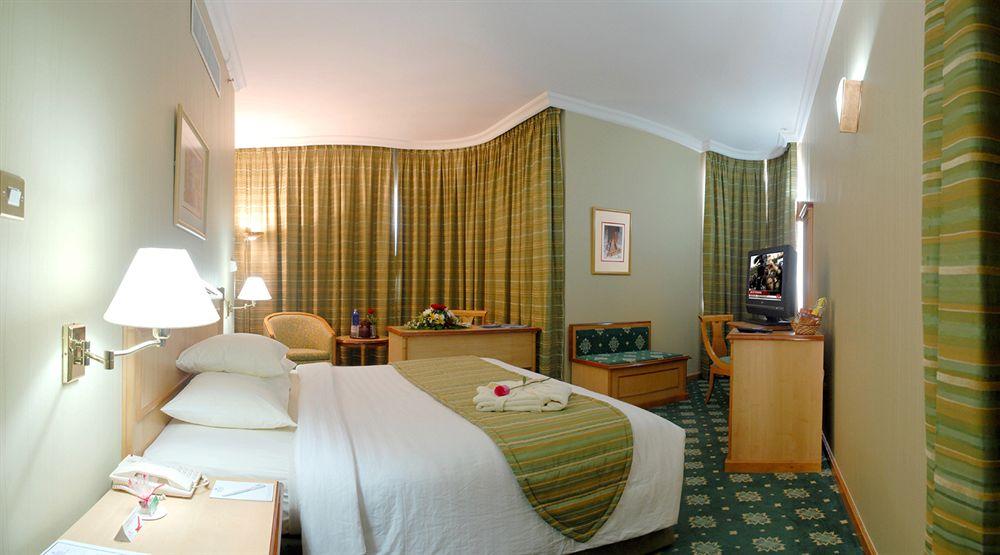 Grand Continental Hotel Абу Даби Стая снимка