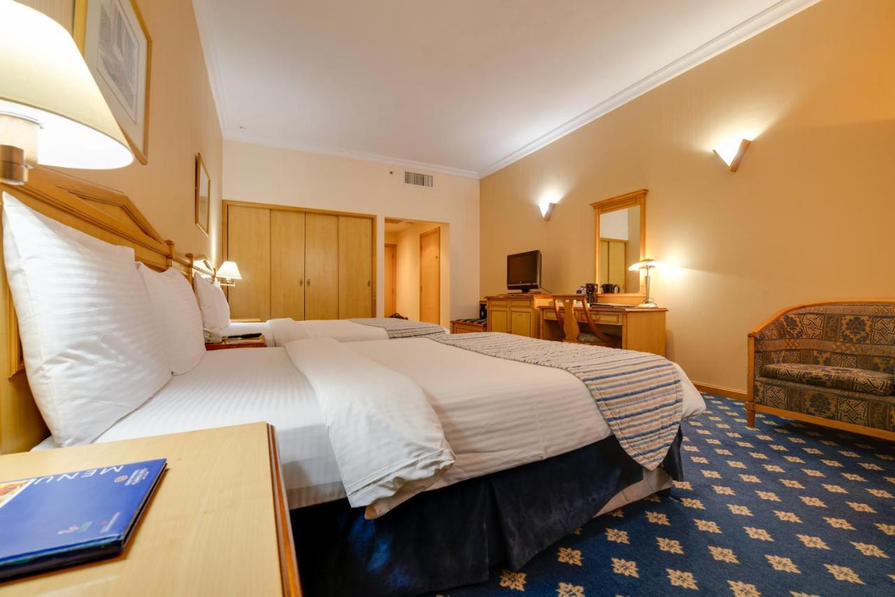 Grand Continental Hotel Абу Даби Екстериор снимка