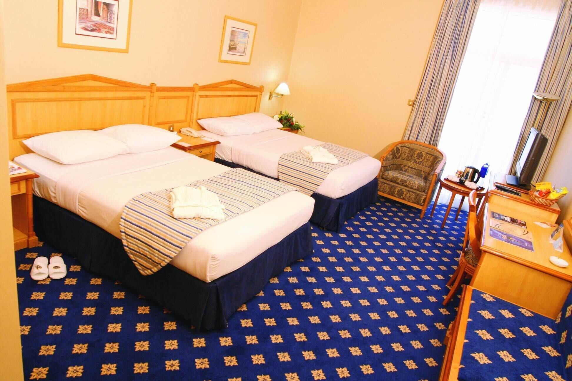 Grand Continental Hotel Абу Даби Стая снимка